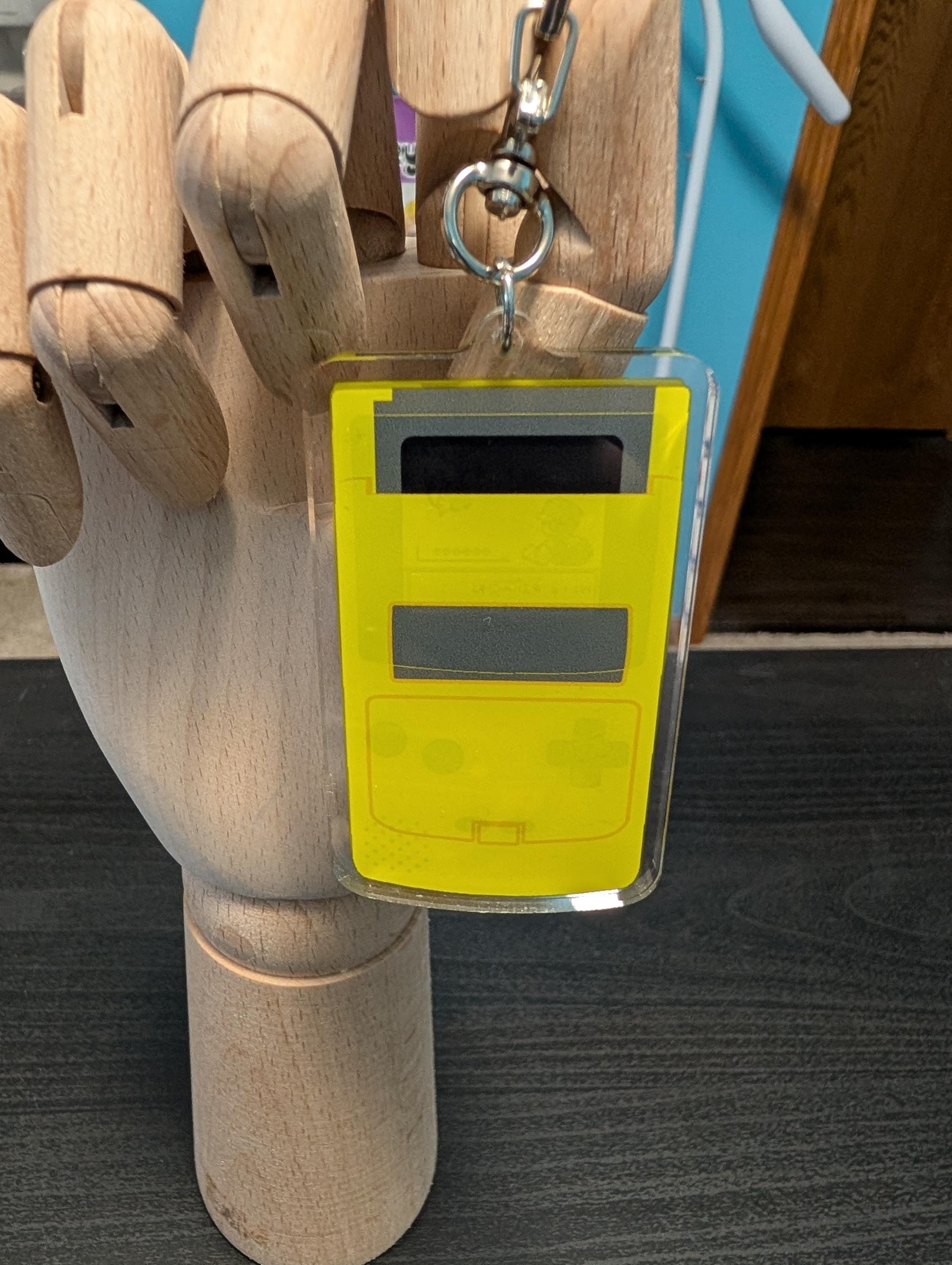 Gameboy shaker keychain inspired by Pokemon Yellow Version