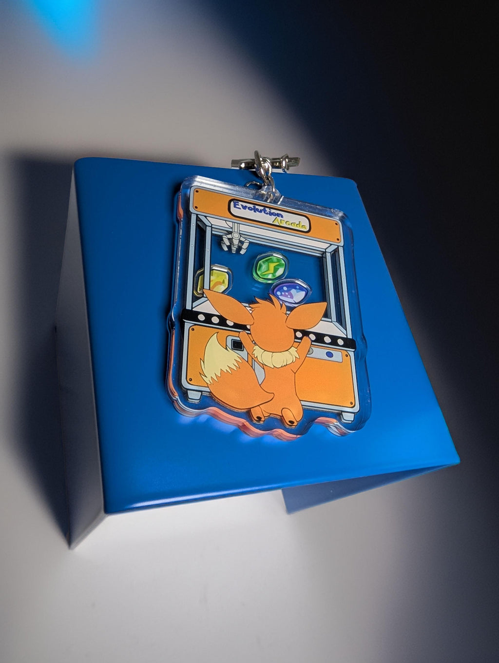 Evolution Arcade shaker keychain inspired by Eevee