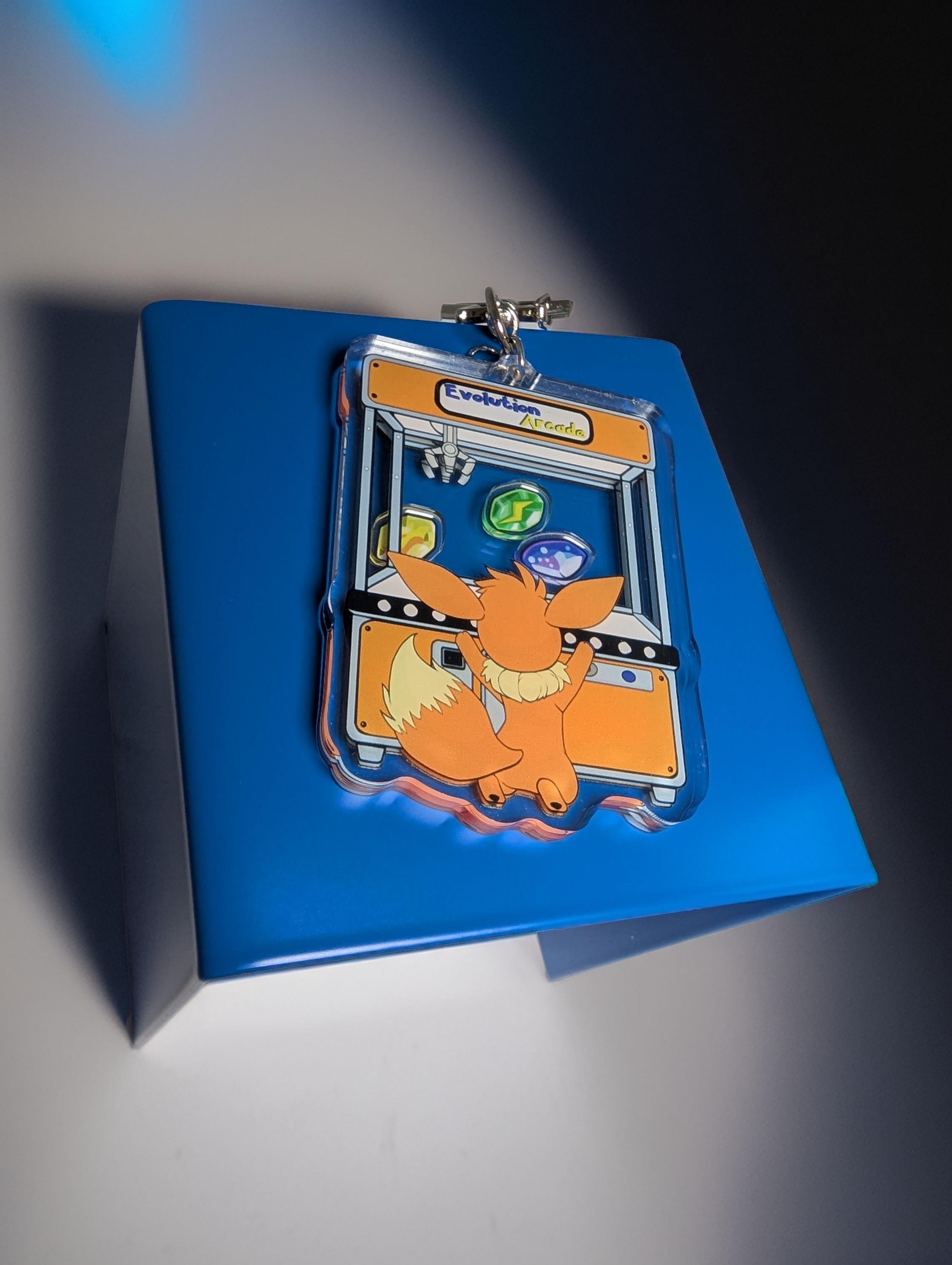 Evolution Arcade shaker keychain inspired by Eevee