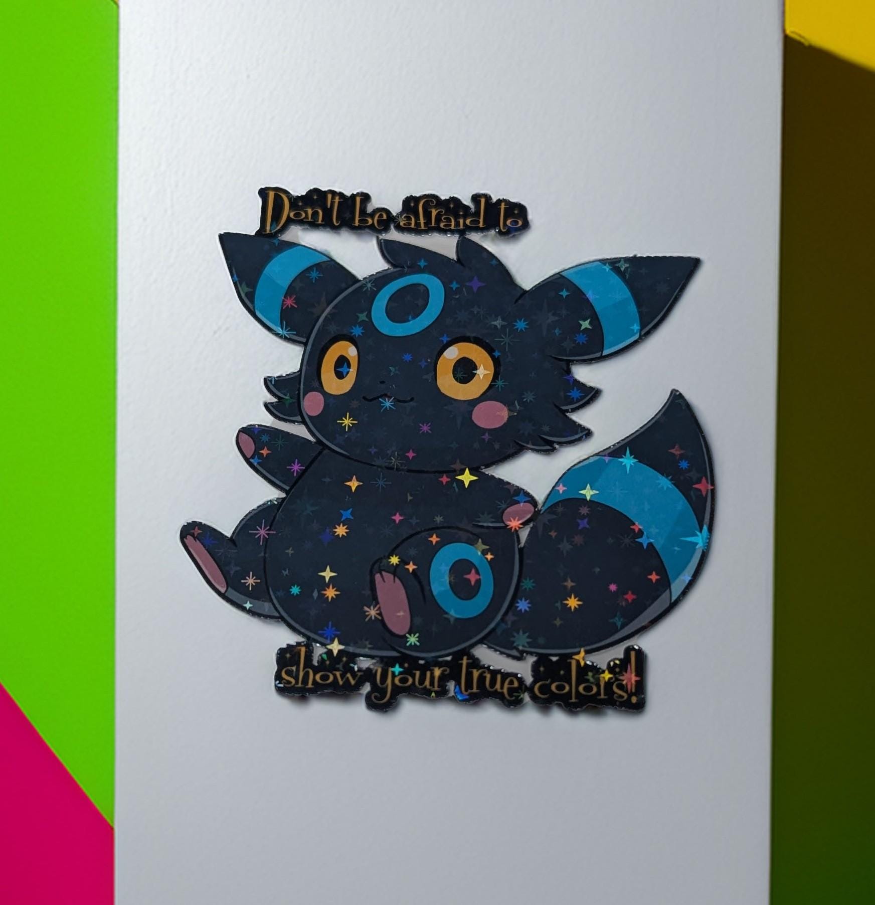 Cartoon character with text 'Don't be afraid to show your true colors' on a colorful background